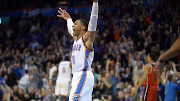 Nov 30, 2016; Oklahoma City, OK, USA; Oklahoma City Thunder guard Russell Westbrook (0) reacts after a play against the Washington Wizards during overtime at Chesapeake Energy Arena. Mandatory Credit: Mark D. Smith-USA TODAY Sports