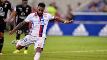 Lyon's French forward Alexandre Lacazette kicks a penalty during the French Ligue 1 football match Olympique Lyonnais (OL) against Caen (SMC) on August 19, 2016, at the Parc Olympique Lyonnais stadium in Decines-Charpieu near Lyon, southeastern France. / AFP / ROMAIN LAFABREGUE (Photo credit should read ROMAIN LAFABREGUE/AFP/Getty Images)