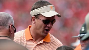Sep 27, 2014; Athens, GA, USA; Denver Broncos quarterback Peyton Manning shown talking to fans on the sidelines during the game between the Tennessee Volunteers and the Georgia Bulldogs during the first half at Sanford Stadium. Mandatory Credit: Dale Zanine-USA TODAY Sports