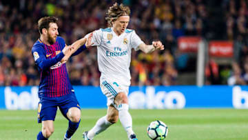 FC Barcelona forward Lionel Messi (10) and Real Madrid midfielder Luka Modric (10) during the match between FC Barcelona v Real Madrid, for the round 36 of the Liga Santander, played at Camp nou on 6th May 2018 in Barcelona, Spain. -- (Photo by Urbanandsport/NurPhoto via Getty Images)