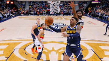 NEW ORLEANS, LOUISIANA - JANUARY 30: Gary Harris #14 of the Denver Nuggets shoots against Solomon Hill #44 of the New Orleans Pelicans during the first half at the Smoothie King Center on January 30, 2019 in New Orleans, Louisiana. NOTE TO USER: User expressly acknowledges and agrees that, by downloading and or using this photograph, User is consenting to the terms and conditions of the Getty Images License Agreement. (Photo by Jonathan Bachman/Getty Images)