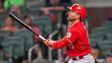 Aug 11, 2021; Cumberland, Georgia, USA; Cincinnati Reds first baseman Joey Votto (19) hits a game tying two run home run against the Atlanta Braves during the ninth inning at Truist Park. Mandatory Credit: Dale Zanine-USA TODAY Sports