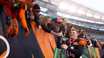 CINCINNATI, OH - DECEMBER 24: Andy Dalton #14 of the Cincinnati Bengals celebrates with fans after defeating the Detroit Lions at Paul Brown Stadium on December 24, 2017 in Cincinnati, Ohio. (Photo by Joe Robbins/Getty Images)