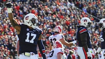 Nov 14, 2015; Auburn, AL, USA; Auburn Tigers linebacker Kris Frost (17) reacts after a tackle during the second quarter Georgia Bulldogs at Jordan Hare Stadium. Mandatory Credit: Shanna Lockwood-USA TODAY Sports