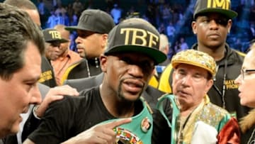 Sep 13, 2014; Las Vegas, NV, USA; Floyd Mayweather in the ring after defeating Marcos Maidana (not pictured) in their WBC & WBA Welterweight and WBC Superwelter Weight title fight at the MGM Grand Garden Arena. Mandatory Credit: Jayne Kamin-Oncea-USA TODAY Sports