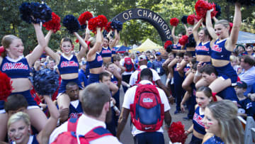 OXFORD, MS - SEPTEMBER 24: Players of the Mississippi Rebels greets fans during the walk into the stadium before a game against the Georgia Bulldogs at Vaught-Hemingway Stadium on September 24, 2016 in Oxford, Mississippi. (Photo by Wesley Hitt/Getty Images)