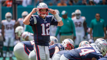 MIAMI GARDENS, FL - SEPTEMBER 15: New England Patriots Quarterback Tom Brady (12) calls a play at the line of scrimmage during the NFL game between the New England Patriots and the Miami Dolphins at the Hard Rock Stadium in Miami Gardens, Florida on September 15, 2019. (Photo by Doug Murray/Icon Sportswire via Getty Images)