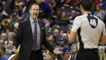 Jan 18, 2016; Washington, DC, USA; Portland Trail Blazers head coach Terry Stotts (L) argues a call with referee Ben Taylor (46) against the Washington Wizards in the third quarter at Verizon Center. The Blazers won 108-98. Mandatory Credit: Geoff Burke-USA TODAY Sports