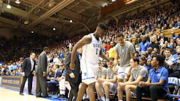 DURHAM, NORTH CAROLINA - FEBRUARY 20: Zion Williamson #1 of the Duke Blue Devils walks off the court after falling as his shoe breaks against Luke Maye #32 of the North Carolina Tar Heels during their game at Cameron Indoor Stadium on February 20, 2019 in Durham, North Carolina. (Photo by Streeter Lecka/Getty Images)