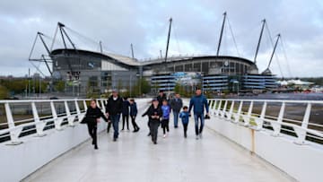 MANCHESTER, ENGLAND - OCTOBER 06: General view outside the stadium as fans walk over a bridge prior to the Premier League match between Manchester City and Wolverhampton Wanderers at Etihad Stadium on October 06, 2019 in Manchester, United Kingdom. (Photo by Alex Livesey/Getty Images)