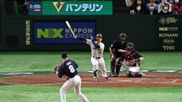TOKYO, JAPAN - MARCH 11: Masataka Yoshida #34 of Japan hits a sacrifice fly to make it 1-7 in the fourth inning during the World Baseball Classic Pool B game between Czech Republic and Japan at Tokyo Dome on March 11, 2023 in Tokyo, Japan. (Photo by Kenta Harada/Getty Images)