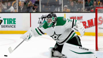 BOSTON, MA - NOVEMBER 05: Dallas Stars goalie Anton Khudobin (35) reaches for the puck during a game between the Boston Bruins and the Dallas Stars on November 5, 2018, at TD Garden in Boston, Massachusetts. (Photo by Fred Kfoury III/Icon Sportswire via Getty Images)