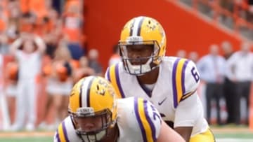 Sep 26, 2015; Syracuse, NY, USA; LSU Tigers quarterback Brandon Harris (6) under center Ethan Pocic (77) during the first quarter in a game against the Syracuse Orange at the Carrier Dome. Mandatory Credit: Mark Konezny-USA TODAY Sports