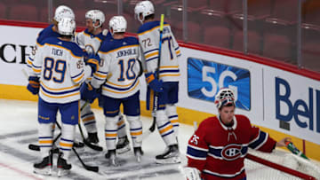 Feb 13, 2022; Montreal, Quebec, CAN; Buffalo Sabres left wing Jeff Skinner (53) celebrates his goal against Montreal Canadiens goaltender Sam Montembeault (35) with teammates during the third period at Bell Centre. Mandatory Credit: Jean-Yves Ahern-USA TODAY Sports