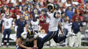 Sep 20, 2015; Landover, MD, USA; St. Louis Rams kicker Greg Zuerlein (4) kicks an extra point against the Washington Redskins in the third quarter at FedEx Field. The Redskins won 24-10. Mandatory Credit: Geoff Burke-USA TODAY Sports