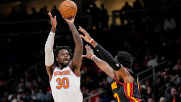 Jan 20, 2023; Atlanta, Georgia, USA; New York Knicks forward Julius Randle (30) shoots over Atlanta Hawks forward Onyeka Okongwu (17) during the first half at State Farm Arena. Mandatory Credit: Dale Zanine-USA TODAY Sports