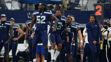 Aug 26, 2022; Arlington, Texas, USA; Seattle Seahawks defensive end Darrell Taylor (52) reacts to a play in the game against the Dallas Cowboys at AT&T Stadium. Mandatory Credit: Tim Heitman-USA TODAY Sports