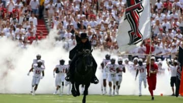 Sep 12, 2015; Lubbock, TX, USA; The Texas Tech Red Raiders masked rider brings the Red Raiders onto the field before the game with the University of Texas at El Paso Miners at Jones AT&T Stadium. Mandatory Credit: Michael C. Johnson-USA TODAY Sports