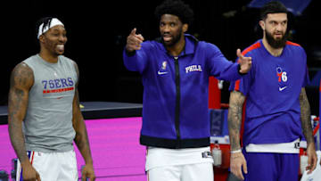 PHILADELPHIA, PENNSYLVANIA - DECEMBER 15: Joel Embiid #21 of the Philadelphia 76ers, center, jokes with Dwight Howard #39 in a game against the Boston Celtics at Wells Fargo Center on December 15, 2020 in Philadelphia, Pennsylvania. NOTE TO USER: User expressly acknowledges and agrees that, by downloading and/or using this photograph, user is consenting to the terms and conditions of the Getty Images License Agreement. (Photo by Tim Nwachukwu/Getty Images)