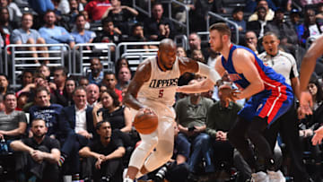 LOS ANGELES, CA - NOVEMBER 7: Marreese Speights #5 of the LA Clippers handles the ball against Jon Leuer #30 of the Detroit Pistons during a game on November 7, 2016 at the STAPLES Center in Los Angeles, California. NOTE TO USER: User expressly acknowledges and agrees that, by downloading and/or using this photograph, user is consenting to the terms and conditions of the Getty Images License Agreement. Mandatory Copyright Notice: Copyright 2016 NBAE (Photo by Juan Ocampo/NBAE via Getty Images)