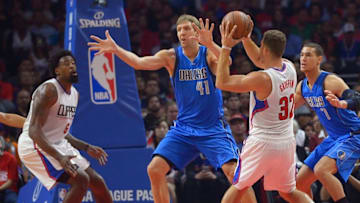 Oct 29, 2015; Los Angeles, CA, USA; Dallas Mavericks forward Dirk Nowitzki (41) defends a pass by Los Angeles Clippers forward Blake Griffin (32) to Los Angeles Clippers center DeAndre Jordan (6) in the first quarter of the game at Staples Center. Mandatory Credit: Jayne Kamin-Oncea-USA TODAY Sports