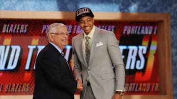 Jun 27, 2013; Brooklyn, NY, USA; C.J. McCollum (Lehigh) shakes hands with NBA commissioner David Stern after being selected as the number eleven overall pick to the Portland Trail Blazers during the 2013 NBA Draft at the Barclays Center. Mandatory Credit: Jerry Lai-USA TODAY Sports