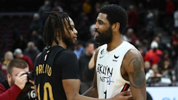 Dec 26, 2022; Cleveland, Ohio, USA; Brooklyn Nets guard Kyrie Irving (11) talks to Cleveland Cavaliers guard Darius Garland (10) after the Nets beat the Cavaliers during the second half at Rocket Mortgage FieldHouse. Mandatory Credit: Ken Blaze-USA TODAY Sports