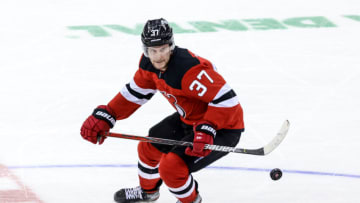New Jersey Devils center Pavel Zacha (37) plays the puck during the third period against the Boston Bruins at Prudential Center. Mandatory Credit: Vincent Carchietta-USA TODAY Sports