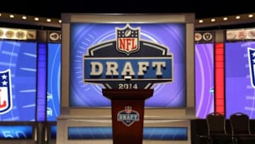 May 8, 2014; New York, NY, USA; General view of a 2014 NFL draft football and helmet before the start of the 2014 NFL draft at Radio City Music Hall. Mandatory Credit: Brad Penner-USA TODAY Sports