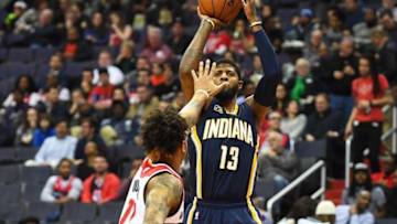 Dec 28, 2016; Washington, DC, USA; Indiana Pacers forward Paul George (13) shoots over Washington Wizards forward Kelly Oubre Jr. (12) during the first half at Verizon Center. Mandatory Credit: Brad Mills-USA TODAY Sports