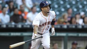 May 4, 2016; Houston, TX, USA; Houston Astros second baseman Jose Altuve (27) hits a home run during the first inning against the Minnesota Twins at Minute Maid Park. Mandatory Credit: Troy Taormina-USA TODAY Sports