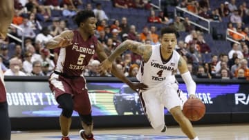 Mar 9, 2016; Washington, DC, USA; Virginia Tech Hokies guard Seth Allen (4) dribbles the ball as Florida State Seminoles guard Malik Beasley (5) defends in the second half during day two of the ACC conference tournament at Verizon Center. The Hokies won 96-85. Mandatory Credit: Geoff Burke-USA TODAY Sports