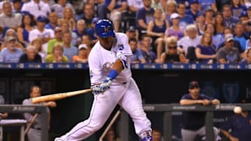 Jun 17, 2016; Kansas City, MO, USA; Kansas City Royals catcher Salvador Perez (13) hits a two run double in the seventh inning against the Detroit Tigers at Kauffman Stadium. The Royals won 10-3. Mandatory Credit: Denny Medley-USA TODAY Sports