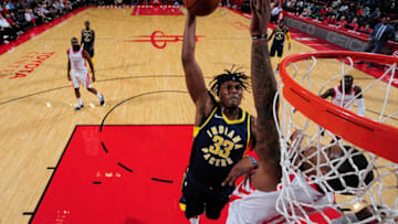 HOUSTON, TX - OCTOBER 4: Myles Turner #33 of the Indiana Pacers shoots the ball against the Houston Rockets during a pre-season game on October 4, 2018 at Toyota Center, in Houston, Texas. NOTE TO USER: User expressly acknowledges and agrees that, by downloading and/or using this Photograph, user is consenting to the terms and conditions of the Getty Images License Agreement. Mandatory Copyright Notice: Copyright 2018 NBAE (Photo by Bill Baptist/NBAE via Getty Images)