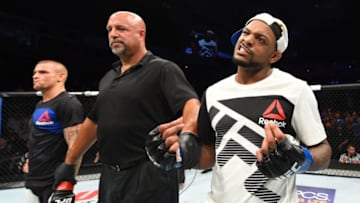 HIDALGO, TX - SEPTEMBER 17: (R-L) Michael Johnson celebrates his knockout victory over Dustin Poirier in their lightweight bout during the UFC Fight Night event at State Farm Arena on September 17, 2016 in Hidalgo, Texas. (Photo by Josh Hedges/Zuffa LLC/Zuffa LLC via Getty Images)