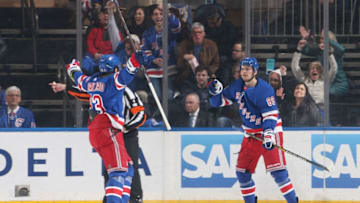 NEW YORK, NY - MARCH 29: Pavel Buchnevich #89 of the New York Rangers celebrates with teammates after scoring a goal in the second period against the St. Louis Blues at Madison Square Garden on March 29, 2019 in New York City. (Photo by Jared Silber/NHLI via Getty Images)