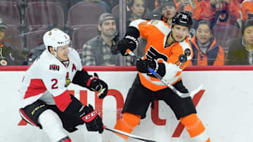 Nov 15, 2016; Philadelphia, PA, USA; Philadelphia Flyers center Brayden Schenn (10) and Ottawa Senators defenseman Dion Phaneuf (2) battles for the puck during the first period at Wells Fargo Center. Mandatory Credit: Eric Hartline-USA TODAY Sports