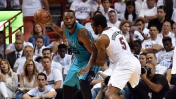 Apr 17, 2016; Miami, FL, USA; Charlotte Hornets center Al Jefferson (25) dribbles the ball as Miami Heat forward Amar'e Stoudemire (5) defends during the second half in game one of the first round of the NBA Playoffs at American Airlines Arena. The Heat won 123-91. Mandatory Credit: Steve Mitchell-USA TODAY Sports