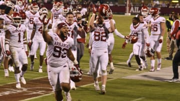 Oct 3, 2020; Starkville, Mississippi, USA; Arkansas Razorbacks players react after defeating the Mississippi State Bulldogs at Davis Wade Stadium at Scott Field. Mandatory Credit: Matt Bush-USA TODAY Sports