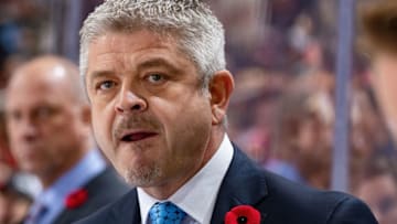 DETROIT, MI - NOVEMBER 03: Head coach Todd McLellan of the Edmonton Oilers watches the action from the bench against the Detroit Red Wings during an NHL game at Little Caesars Arena on November 3, 2018 in Detroit, Michigan. The Oilers defeated the Wings 4-3. (Photo by Dave Reginek/NHLI via Getty Images)