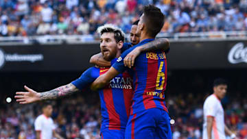 VALENCIA, SPAIN - OCTOBER 22: Lionel Messi of FC Barcelona celebrates with his team mates Neymar Jr. (C) and Denis Suarez after scoring his team's third from the penalty spot goal during the La Liga match between Valencia CF and FC Barcelona at Mestalla stadium on October 22, 2016 in Valencia, Spain. (Photo by David Ramos/Getty Images)