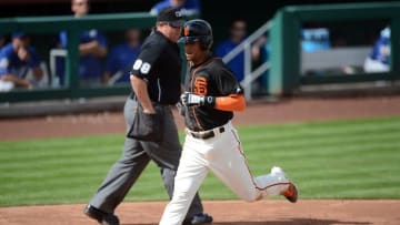 Mar 6, 2016; Scottsdale, AZ, USA; San Francisco Giants center fielder Gorkys Hernandez (66) scores on a wild pitch during the third inning against the Los Angeles Dodgers at Scottsdale Stadium. Mandatory Credit: Joe Camporeale-USA TODAY Sports
