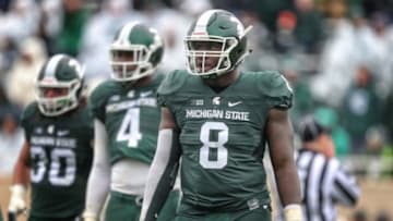 Oct 3, 2015; East Lansing, MI, USA; Michigan State Spartans defensive lineman Lawrence Thomas (8) stands on the field during the 1st quarter of a game against the Purdue Boilermakers at Spartan Stadium. Mandatory Credit: Mike Carter-USA TODAY Sports