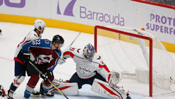 DENVER, CO - NOVEMBER 16: Colorado Avalanche center Colin Wilson (22) puts a shot past Washington Capitals goalies Philipp Grubauer (31) for a second period goal during a regular season game between the Colorado Avalanche and the visiting Washington Capitals on November 16, 2017, at the Pepsi Center in Denver, CO. (Photo by Russell Lansford/Icon Sportswire via Getty Images)