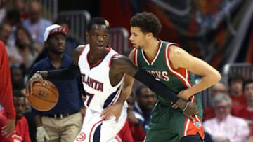 Mar 30, 2015; Atlanta, GA, USA; Atlanta Hawks guard Dennis Schroder (17) is guarded by Milwaukee Bucks guard Michael Carter-Williams (5) in the second quarter of their game at Philips Arena. Mandatory Credit: Jason Getz-USA TODAY Sports