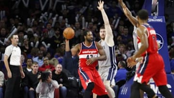 Nov 21, 2015; Auburn Hills, MI, USA; Washington Wizards forward Nene Hilario (42) looks to pass the ball against Detroit Pistons forward Aron Baynes (12) during the fourth quarter at The Palace of Auburn Hills. Wizards win 97-95. Mandatory Credit: Raj Mehta-USA TODAY Sports