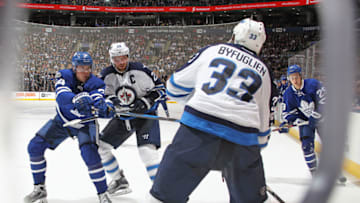 TORONTO,ON - FEBRUARY 21: Dustin Byfuglien #33 of the Winnipeg Jets looks to clear a puck out against the Toronto Maple Leafs during an NHL game at Air Canada Centre on February 21, 2017 in London, Ontario, Canada. The Maple Leafs defeated the Jets 5-4 in overtime. (Photo by Claus Andersen/Getty Images)