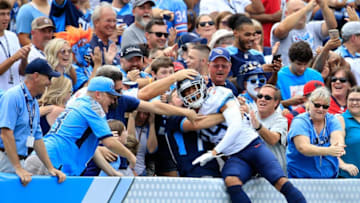 NASHVILLE, TN - SEPTEMBER 16: Dane Cruikshank #29 of the Tennessee Titans jumps into the crowd after scoring a touchdown against the Houston Texans at Nissan Stadium on September 16, 2018 in Nashville, Tennessee. (Photo by Andy Lyons/Getty Images)