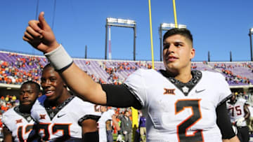 Nov 19, 2016; Fort Worth, TX, USA; Oklahoma State Cowboys quarterback Mason Rudolph (2) waves to fans after the game against the TCU Horned Frogs at Amon G. Carter Stadium. Mandatory Credit: Kevin Jairaj-USA TODAY Sports
