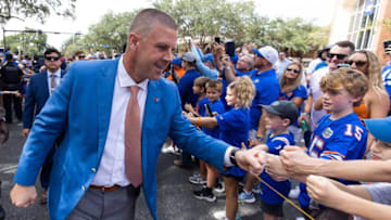 Florida Gators head coach Billy Napier gives fist bumps during Gator Walk at Steve Spurrier Field at Ben Hill Griffin Stadium in Gainesville, FL on Saturday, October 7, 2023. [Doug Engle/Gainesville Sun]